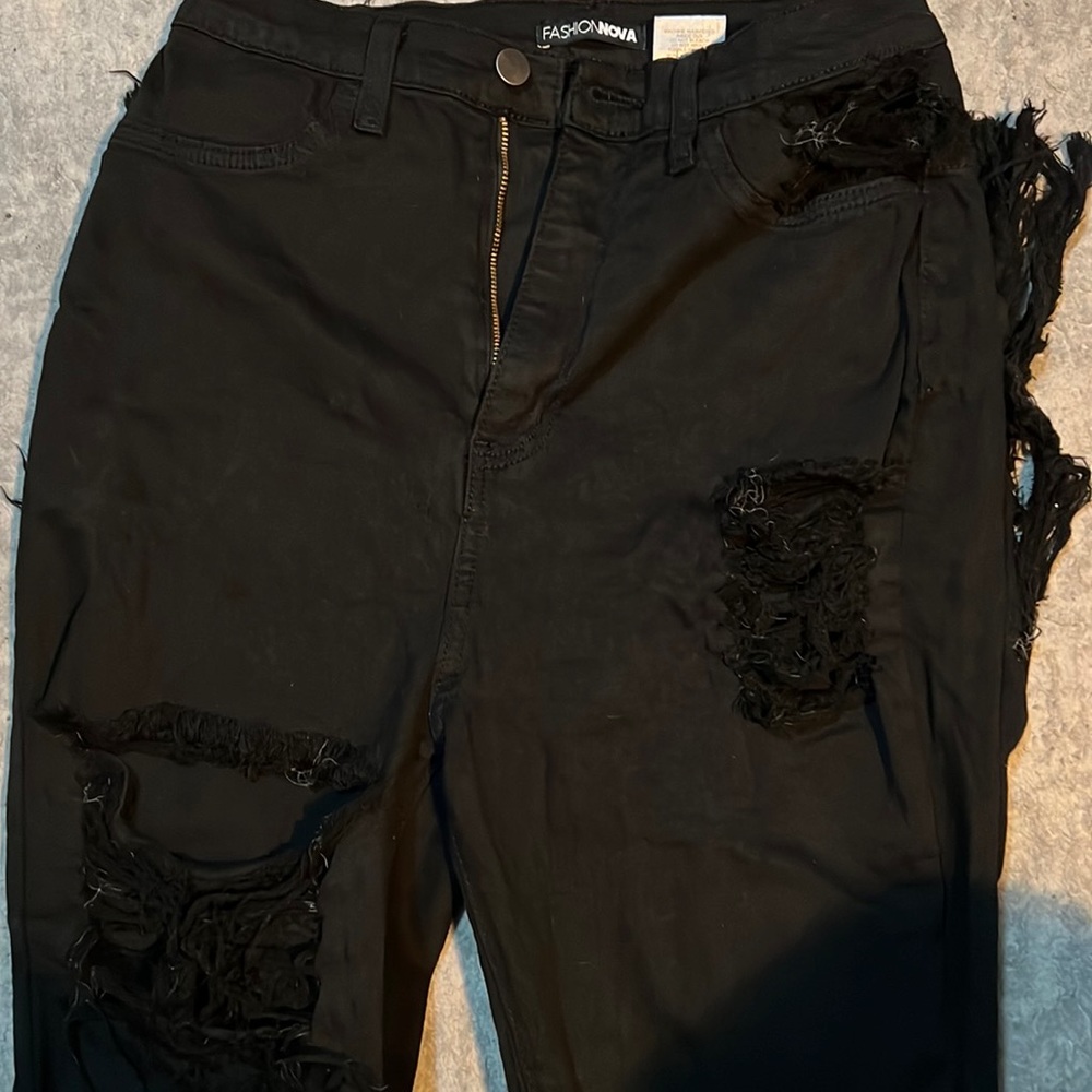 Fashion Nova flare leg womens black Ripped jeans